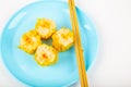 Siu Mai - Chinese steamed pork dumplings on blue plate Royalty Free Stock Photo