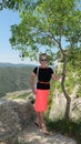 Beautiful woman on the background of mountains, in the village of Siurana.