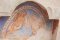 SIUSI, ITALY - JULY 27, 2017: Fresco outside the wall of the Maria Ausiliatrice church representing a moment on the Way of the