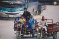 Local Egyptian Families with Children riding on the Bikes through the Siwa Oasis Streets