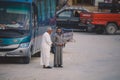 Local Egyptian Families: Men, Women, Children walking on the Siwa Oasis Streets and Talking together