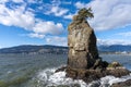 Siwash Rock, Stanley Park Seawall in sunny day. Vancouver Royalty Free Stock Photo