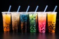 Six big plastic cups of bubble tea in a row. Popular asian tapioca teenagers drink. Royalty Free Stock Photo