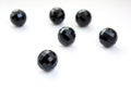 Six black beads