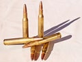 Six 30.06 caliber bullets on a white background Royalty Free Stock Photo