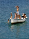 Six children on boat Royalty Free Stock Photo