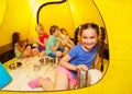 Six children play in a tent Royalty Free Stock Photo