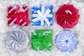 Six Christmas gift boxes in fluffy padding Royalty Free Stock Photo