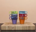 Six colored cups of coffee Royalty Free Stock Photo