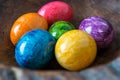 Colorful easter eggs in a wooden bowl Royalty Free Stock Photo