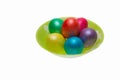 Six Easter eggs on a green plate, isolated Royalty Free Stock Photo