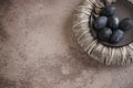 Six dark colored eggs on a plate Royalty Free Stock Photo