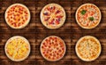 Six different pizza set for menu. Meat pizzas with 1Pepperoni 2ham and bacon 3 pizza with seafood 4pizza four cheese 5 pepp Royalty Free Stock Photo