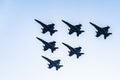 Six F18 Hornet jet fighters flying a blue sky day Royalty Free Stock Photo