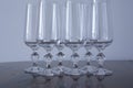 Six glasses over a table close-up waiting for celebration, Royalty Free Stock Photo