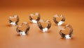 Six Heart-Shaped Crystals on Orange Background Royalty Free Stock Photo