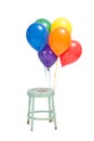 Six Helium Balloons Tied To Stool