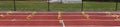 Six inch yellow hurdles set up on a track for sprinter to run over