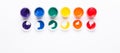Six jars of paint on a white background Isolated Multicolored gouache Top view Banner Horizontal Royalty Free Stock Photo