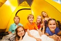 Six kids in a tent having fun together Royalty Free Stock Photo