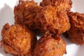 Six large Indian onion bhajis Royalty Free Stock Photo