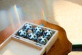 Six metallic petanque balls with highlights in wood box ready to play Royalty Free Stock Photo