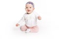 Six month old baby, in front of a white background Royalty Free Stock Photo