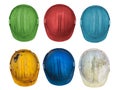 Six old colorful construction helmets Royalty Free Stock Photo