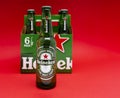 Six pack of Heineken light lager beer on red