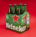 Six pack of Heineken light lager beer on red