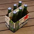 A six pack of non-alcoholic Heineken beers.