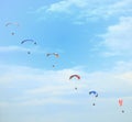 Six paragliders in the sky