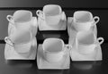 Six porcelain cups of coffee Royalty Free Stock Photo