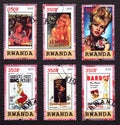 Six postage stamps reproducing Movie posters with Brigitte Bardot Royalty Free Stock Photo