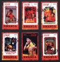 Six postage stamps reproducing Movie posters with Bruce Lee Royalty Free Stock Photo