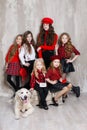 Six pretty girls of different ages, six sisters are posing indoors during repairs