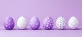 Six Purple And White Polka Dot Easter Eggs In A Row On Purple Background With Copy Space Royalty Free Stock Photo
