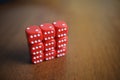 Six red dice on a table Royalty Free Stock Photo