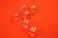 Six red dices with white spots isolated on red Royalty Free Stock Photo