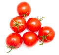 Six red tomatoes on a white background Royalty Free Stock Photo