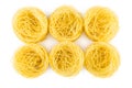 Six rolls of pasta capellini isolated on white