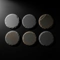 Six round stone coasters are arranged in two rows against a dark background Royalty Free Stock Photo