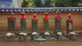 Six shinto saint spirits embodied in statues and dressed in red hoods Royalty Free Stock Photo