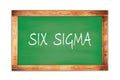 SIX SIGMA text written on green school board