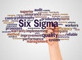 Six Sigma word cloud and hand with marker concept