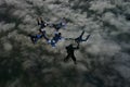 Six skydivers building a formation Royalty Free Stock Photo