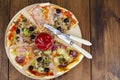 Six slices of pizza with different toppings on wooden board Royalty Free Stock Photo