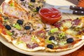 Six slices of pizza with different toppings on wooden board Royalty Free Stock Photo