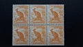 Six stapled postage stamps of old, Australia with kangaroo. Royalty Free Stock Photo