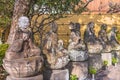 Six statues of sitting Jizo bodhisattva or Jizo Bosatsu in the Tamonji Temple.